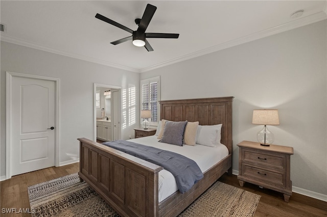 bedroom featuring ensuite bathroom, dark hardwood / wood-style flooring, ceiling fan, and ornamental molding