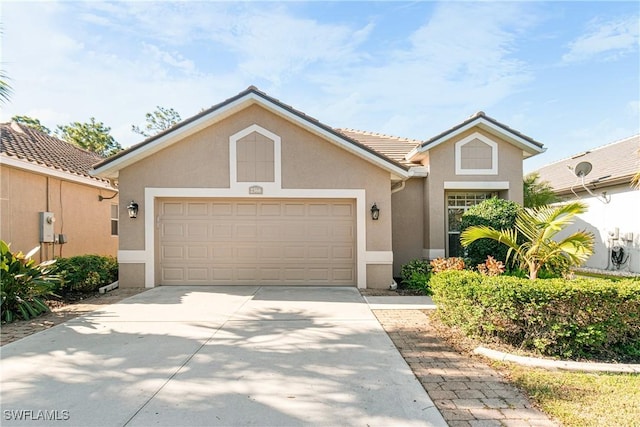 view of front of house with a garage