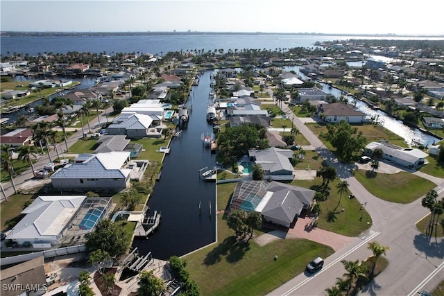 bird's eye view with a water view