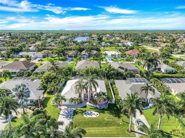 birds eye view of property with a residential view