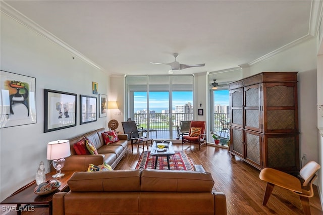 living room with wood-type flooring, floor to ceiling windows, ornamental molding, and ceiling fan