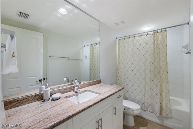 full bathroom with tile patterned floors, vanity, toilet, and shower / tub combo