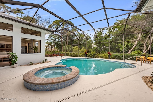 view of pool featuring an in ground hot tub, a patio, and a lanai