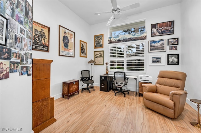 office space with ceiling fan and light hardwood / wood-style floors