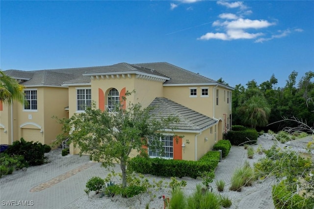 view of property exterior featuring a garage