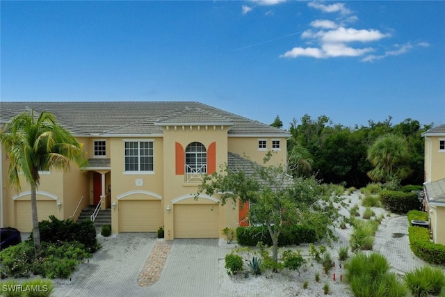 mediterranean / spanish-style house featuring a garage