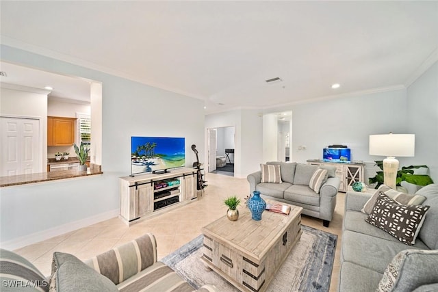 living room featuring ornamental molding and light tile patterned flooring