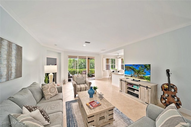 tiled living room with ornamental molding