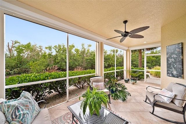 sunroom / solarium with ceiling fan