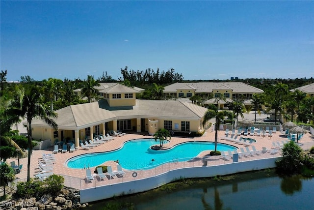 view of swimming pool with a patio area