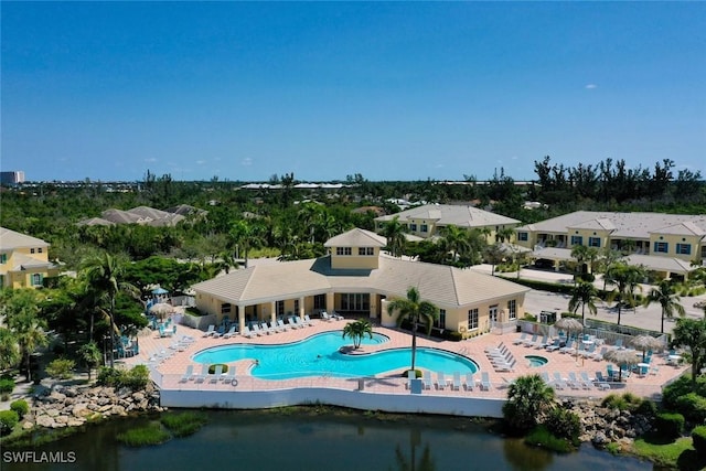 birds eye view of property featuring a water view