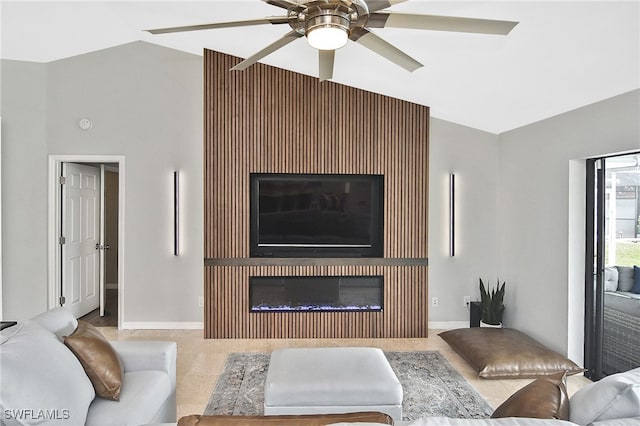 living room featuring vaulted ceiling and a large fireplace