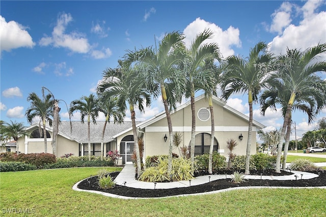 exterior space featuring a front lawn