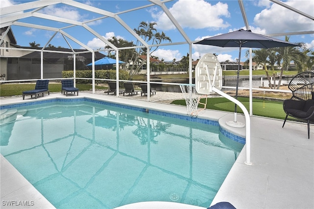 view of swimming pool with a lanai and a patio