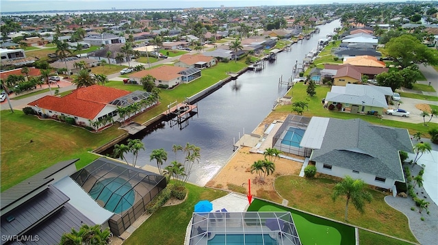 drone / aerial view with a water view