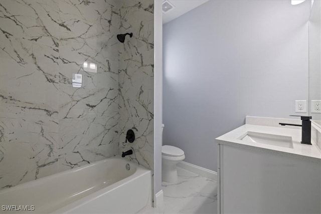 full bathroom featuring toilet, vanity, and tiled shower / bath combo