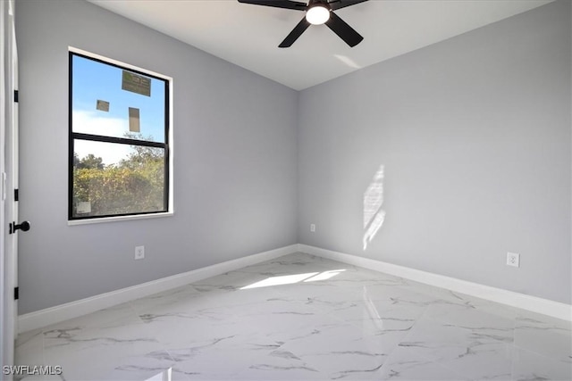 unfurnished room featuring ceiling fan