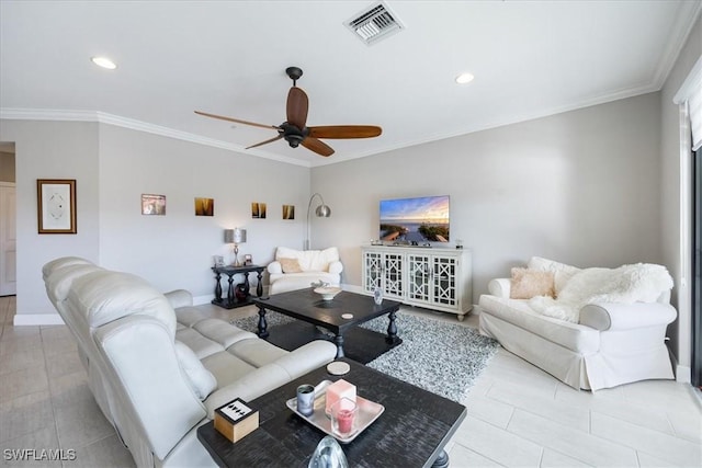 living room with crown molding, ceiling fan, and light tile patterned floors