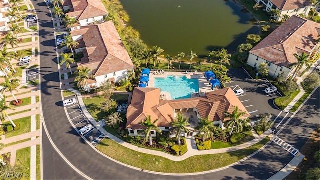 bird's eye view with a water view