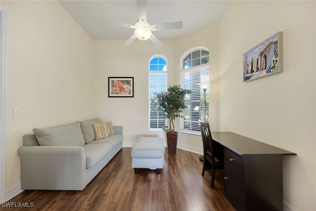 office with dark wood-type flooring, ceiling fan, and a wealth of natural light