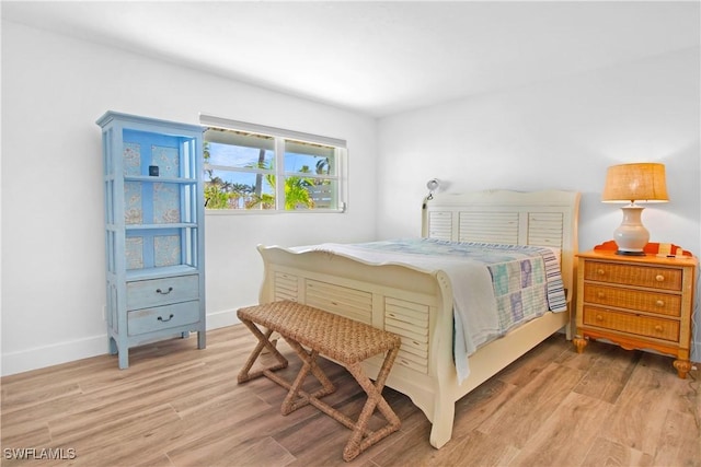 bedroom with light hardwood / wood-style flooring