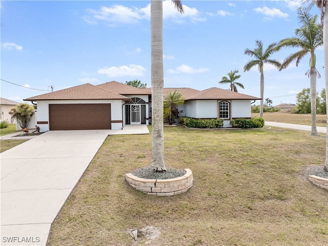 single story home with a garage and a front lawn