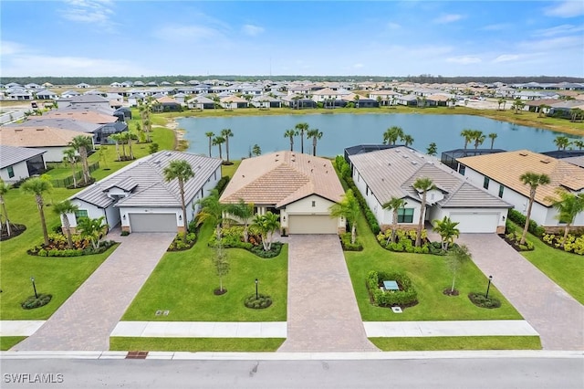 bird's eye view with a water view