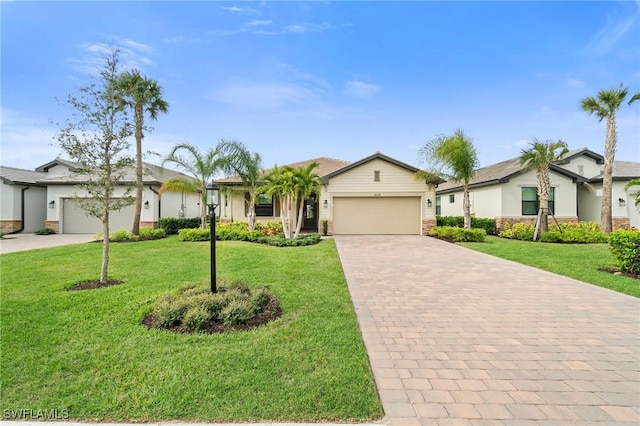 ranch-style house with a front lawn and a garage