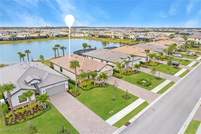 drone / aerial view featuring a water view