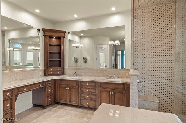 bathroom with a shower, vanity, and tasteful backsplash