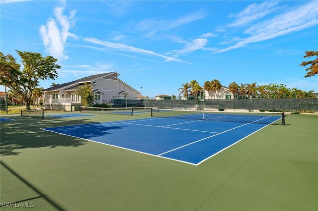 view of tennis court with basketball court