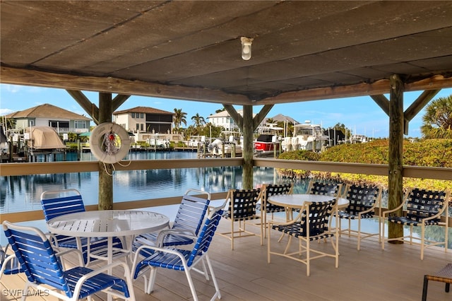 view of patio with a water view