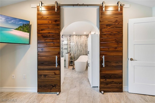 bathroom with independent shower and bath and vaulted ceiling