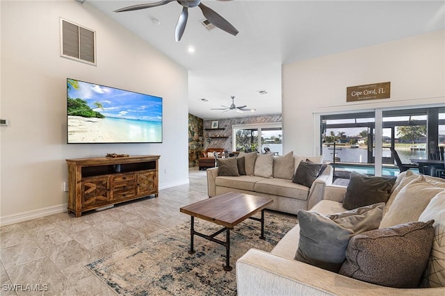 living room featuring high vaulted ceiling and ceiling fan