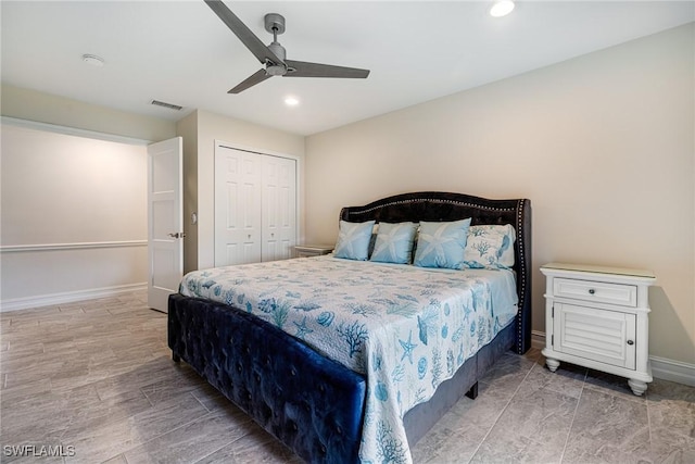 bedroom featuring ceiling fan and a closet