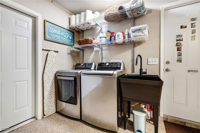 laundry area with separate washer and dryer