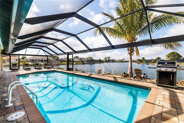 view of pool featuring a water view, area for grilling, a lanai, and a patio area