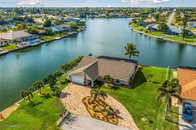 drone / aerial view with a water view