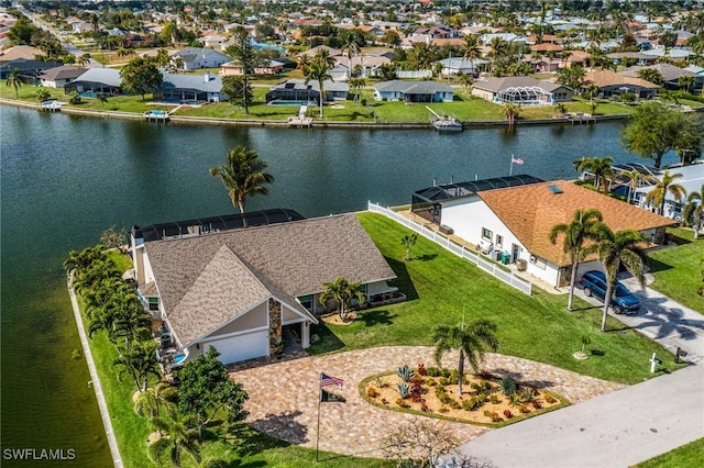 drone / aerial view featuring a water view