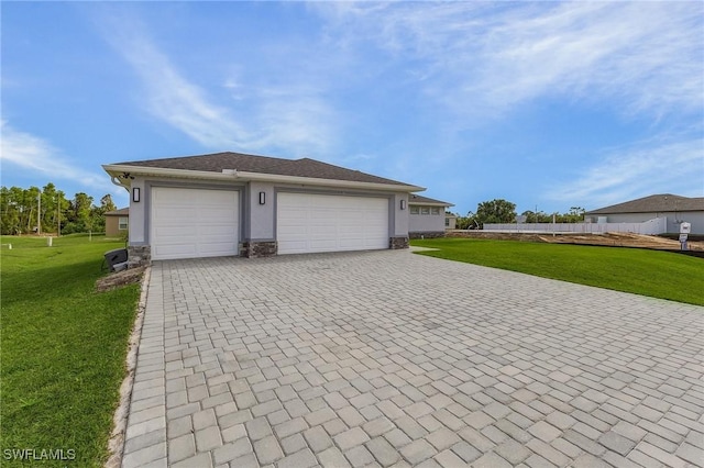 garage with a yard