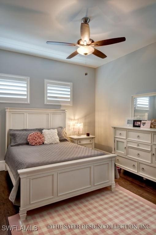 bedroom with ceiling fan and light wood-type flooring