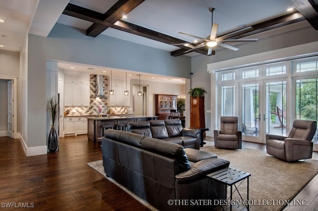 living room featuring a towering ceiling, french doors, beam ceiling, ceiling fan, and dark hardwood / wood-style floors