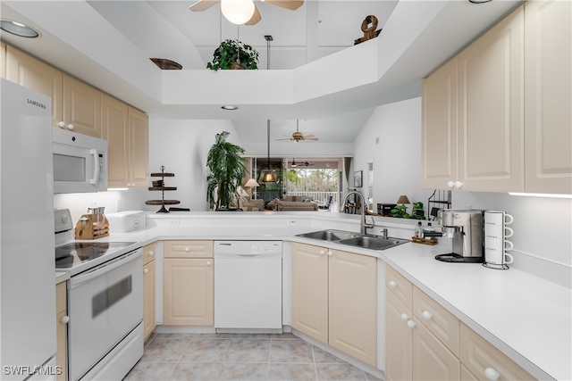 kitchen with ceiling fan, light tile patterned floors, sink, and white appliances