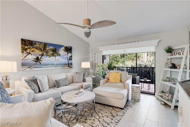 living room with ceiling fan and vaulted ceiling