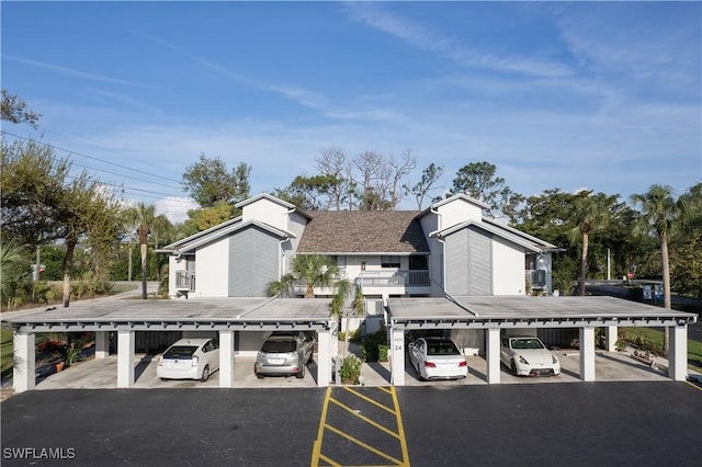 view of front of property with a carport