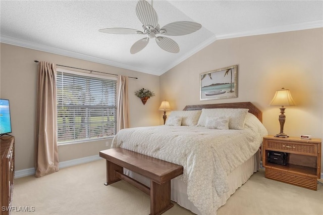 bedroom featuring vaulted ceiling, crown molding, light carpet, ceiling fan, and baseboards
