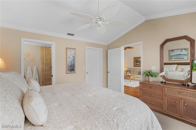 bedroom featuring ceiling fan, crown molding, and lofted ceiling