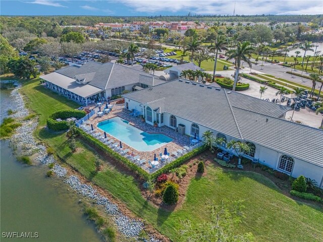 drone / aerial view with a water view