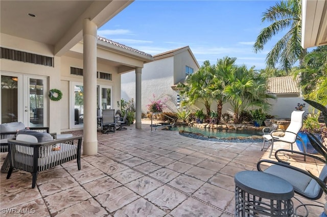 view of patio featuring french doors