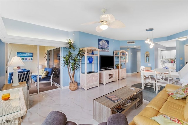 living room with ceiling fan